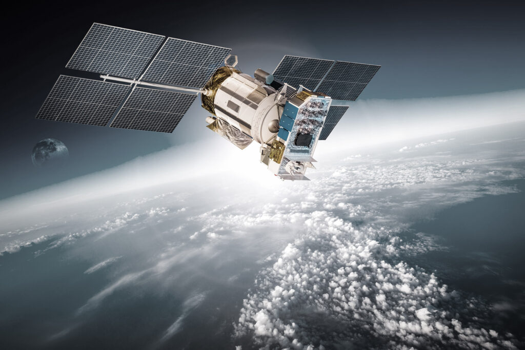 A stock image of a satellite orbiting in space